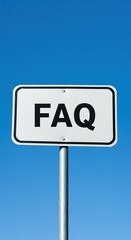 FAQ Sign Against Clear Blue Sky - Frequently Asked Questions Concept.