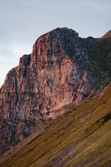 A Majestic Mountain Peak Glowing at Sunset, Captivating the Heart and Soul of Natures Beauty