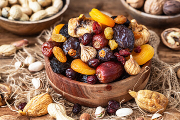 Nuts and dried fruit mix, healthy and wholesome food. Symbols of judaic holiday Tu Bishvat
