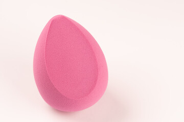 Pink makeup sponge. Isolate on a white background.