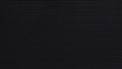 Obraz premium dark and black woven fabric texture background. cotton material. black woven fabric texture