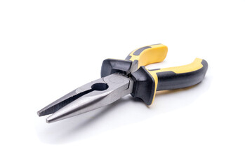 Yellow and black needle nose pliers resting on white background