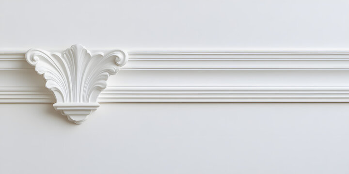 Elegant white molding with ornate detail adds architectural interest to a wall.