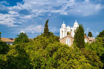 Naklejka premium Iera Moni Timiou Prodromou with Lush Greenery
