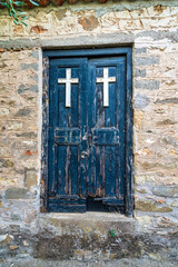 Rustic Wooden Door with Crosses