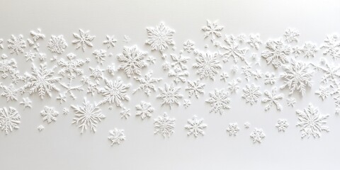 Delicate snowflakes falling on white background