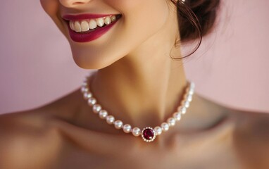 A radiant close-up of a woman wearing a pearl and ruby necklace, her smile captivating against a light pink backdrop for valentines day