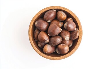 Fototapeta premium A wooden bowl filled with nuts on a white surface