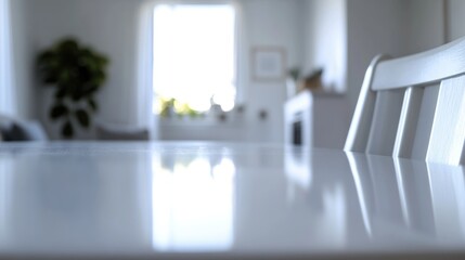 A close-up shot of a white table with chairs, perfect for interior design or hospitality settings
