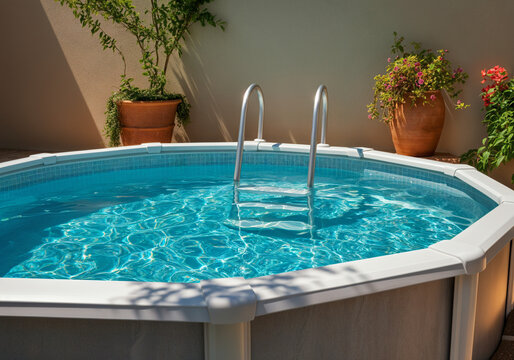 Above ground pool glistens under the summer sun, complete with a convenient metal ladder, ready for a refreshing swim