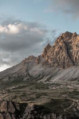 Majestic mountain range captured in Europe showcasing rugged cliffs and dramatic skies at dusk