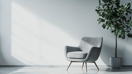 Minimalist living room with gray armchair and potted plant
