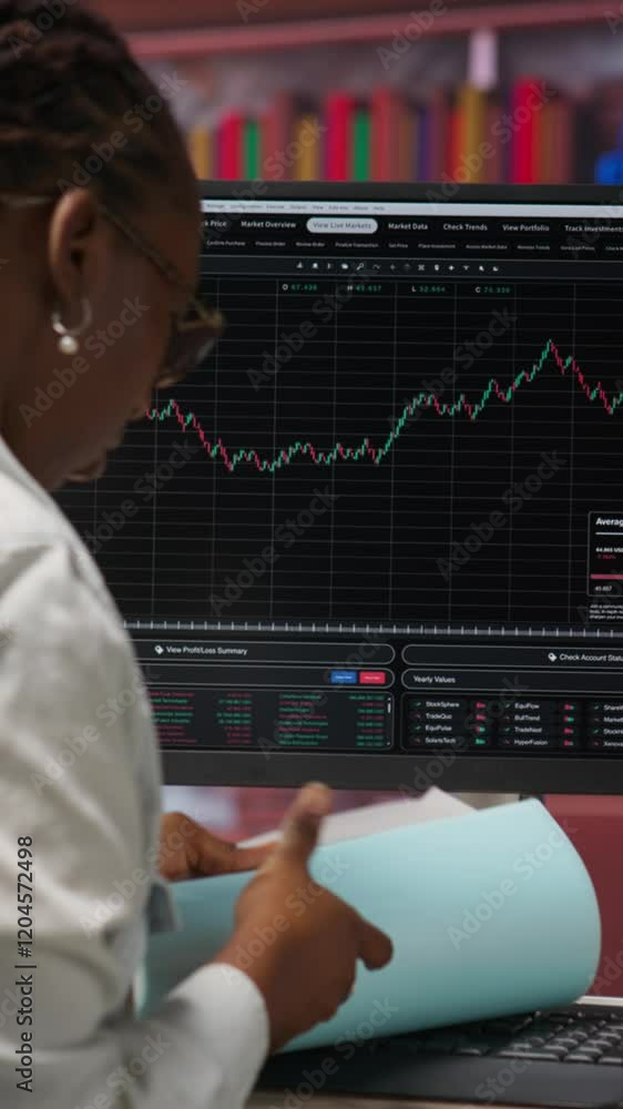 Poster vertical video day trader using pc to purchase and sell stocks, reading files, aiming to capitalize 