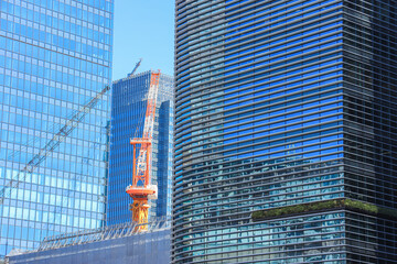 建設中の高層ビルと都市開発の風景　開発イメージ