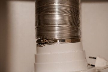 Close-Up of a Silver Duct Hose and Connector Fastener
