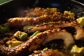 Pan Seared Octopus with Vegetables. Food close up, macro