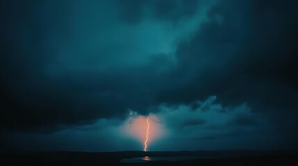 Lightning strike over dark lake at night.