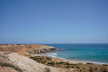Scenic beach cliffs on South Australian coastal area. Maslin Beach, Pt Willunga area with waves. Artwork with artistic tones.