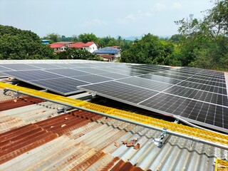 Installing solar panels on the roof to use as alternative energy for electricity use.