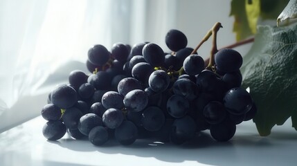 Fresh Bunch of Black Grapes Beautifully Arranged on a Clean White Surface in Bright Lighting with Natural Shadows and Vibrant Colors