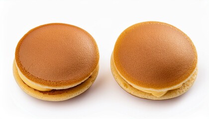 Two delicious-looking mini pancakes with creamy filling.