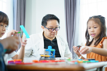 Group of diverse children enjoy learning about the STEM.