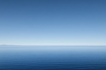 Obraz premium Expansive Open Sea with Calm Waters and Clear Blue Sky Suitable for Offshore Wind Turbine Exploration and Renewable Energy Themes
