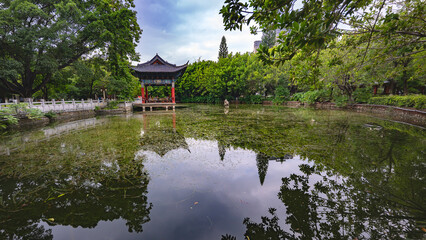 Obraz premium Reflections in the lake, Zhu family garden, old traditional chinese house in Jianshui china