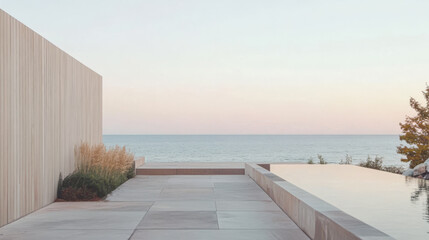 Coastal modern architecture with serene pool and landscape at sunset