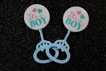 Blue Baby rattle on Shiny Black Background