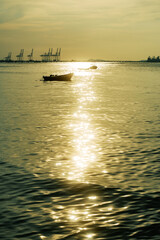 Sunlight is reflected on sea surface at evening