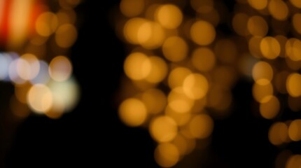 Fototapeta premium Abstract blurry golden lights bokeh.