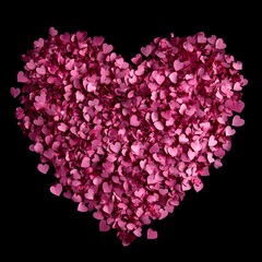Fototapeta premium A heart-shaped arrangement of pink confetti on a dark background, ideal for romantic celebrations and love-themed designs.