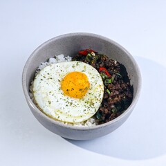 black pepper beef rice bowl with egg topping