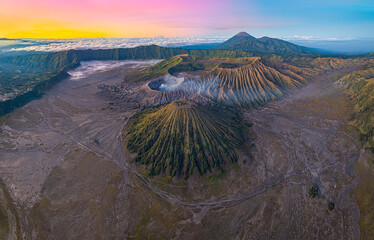 .Aerial view morning sun splashing against the ridge of the Bromo volcano group.The white smoke...