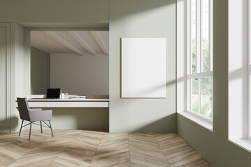 Blank framed poster template on green wall in modern minimalist office with wooden floor and natural light from large windows. 3D Rendering