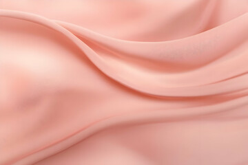 Fototapeta premium Smooth Peach Fabric Flows Gently, Creating Elegant Waves and Soft Folds for a Dreamy Texture.