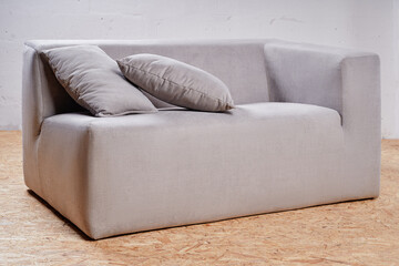 Modern Comfortable Sofa with Two Cushions in Contemporary Interior Style