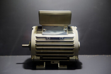 Industrial Electric Motor Isolated on Dark Background in Studio Lighting