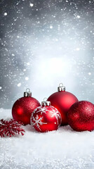 Red Christmas Ornaments Rest on Snow with Falling Snowflakes Beautifully Festive Scene