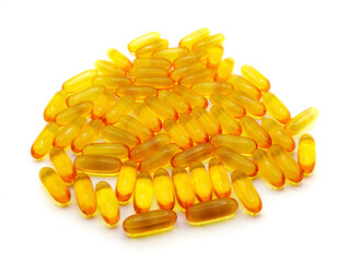 Close-up image of fish oil capsules placed on a white background, showcasing their smooth, shiny, and translucent surface