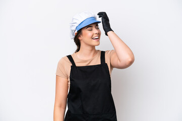Fishmonger brazilian woman wearing an apron isolated on white background has realized something and intending the solution