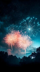 Fireworks illuminate the night sky beautifully with colorful bursts over silhouetted trees.