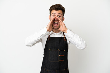 Restaurant caucasian waiter isolated on white background shouting and announcing something