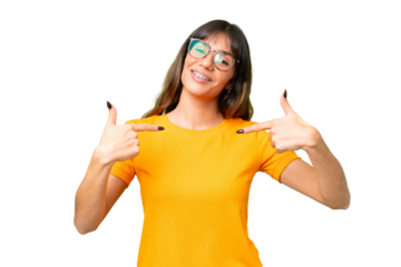 Young caucasian woman over isolated chroma key background proud and self-satisfied