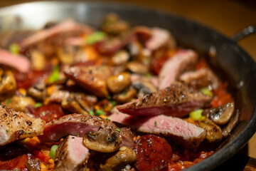 Paella with pork. It is one of the best-known dishes in Spanish cuisine.