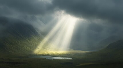 Dramatic sun rays breaking through dark clouds illuminating a valley.