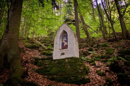 Old stone Stations of the cross in forest near Prachatice, Czech republic