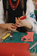 Close-up of hands making a candle from beeswax. Master class on creating a candle. DIY. Part of the series