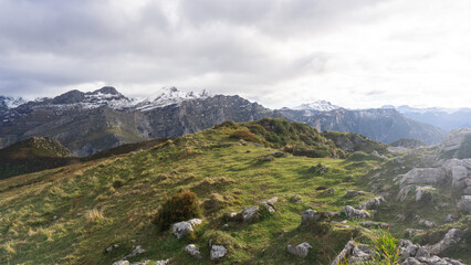 View of a mountain scenary from the top of a peak on an ideal mountain day